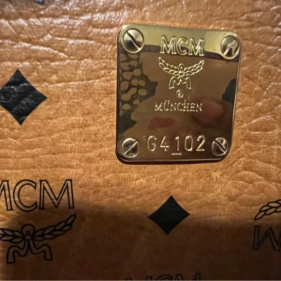 MCM Cognac Visetos Coated Canvas Heritage Boston Bag.
